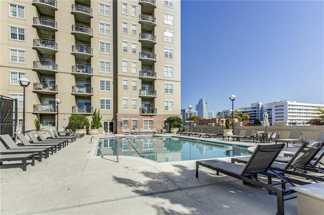 view of swimming pool featuring a patio