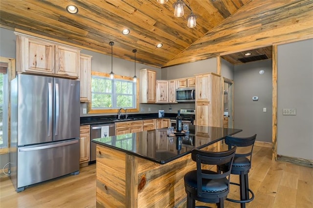 102 Waleska Ln, Ellijay, GA 30540 - kitchen featuring stainless steel appliances, light brown cabinets, lofted ceiling, dark countertops, and wooden ceiling