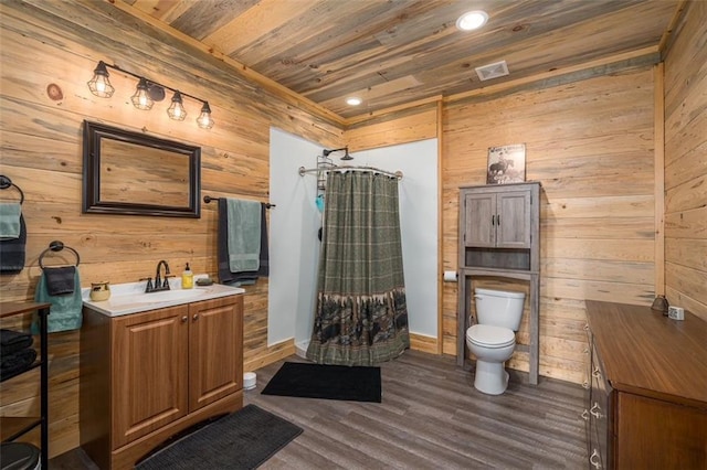 102 Waleska Ln, Ellijay, GA 30540 - bathroom with wooden ceiling, wood walls, a shower with shower curtain, vanity, and toilet