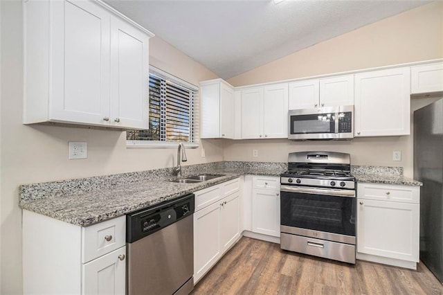 kitchen featuring sink, white cabinetry, and stainless steel appliances