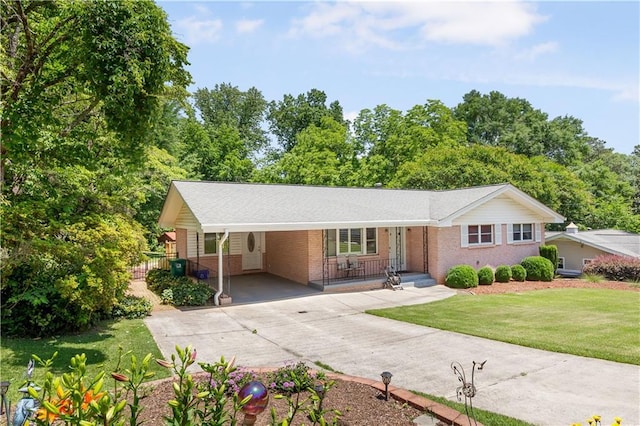 701 Rosedale Dr SE, Smyrna, GA 30082 - ranch-style home with brick siding, driveway, a carport, a front lawn, and covered porch