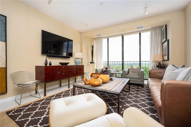 145 15th St NE Unit 1225, Atlanta, GA 30309 - living area featuring baseboards