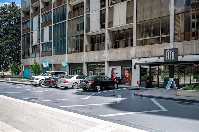 145 15th St NE Unit 1225, Atlanta, GA 30309 - view of commercial property featuring uncovered parking