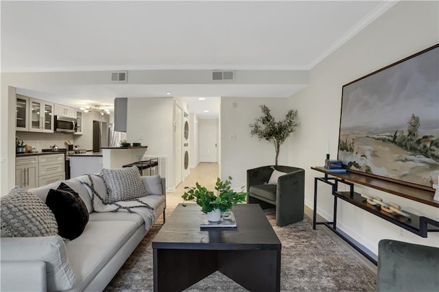 living room featuring ornamental molding