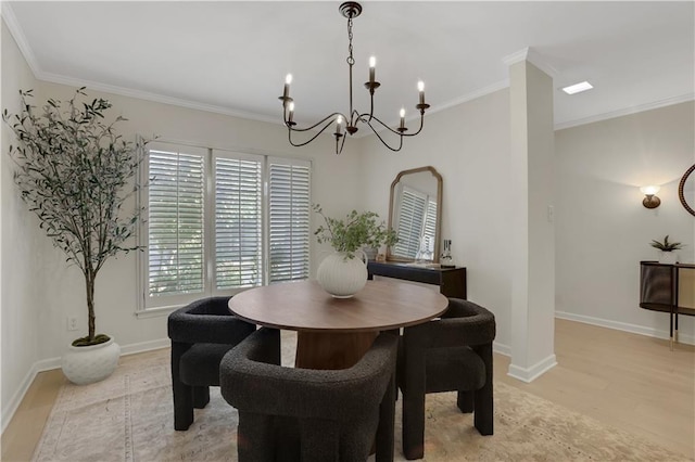 dining area with ornamental molding and light wood-type flooring