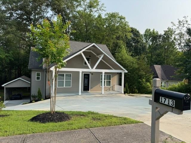 1713 Cagle Ct, Lawrenceville, GA 30045 - view of front of house with covered porch and concrete driveway