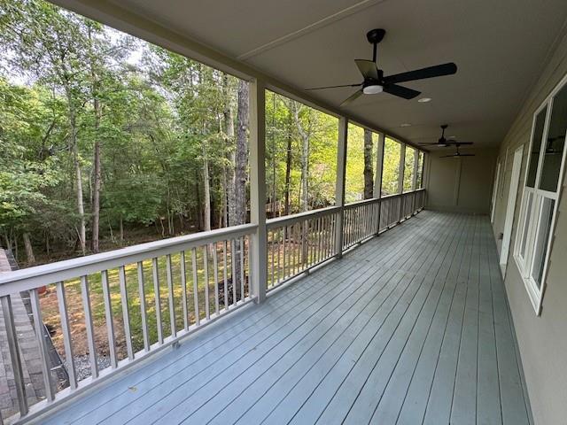 1713 Cagle Ct, Lawrenceville, GA 30045 - unfurnished sunroom featuring a ceiling fan