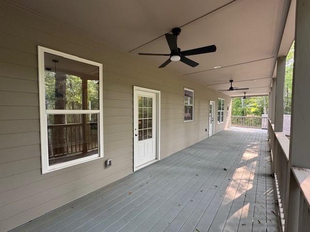 1713 Cagle Ct, Lawrenceville, GA 30045 - wooden terrace featuring ceiling fan