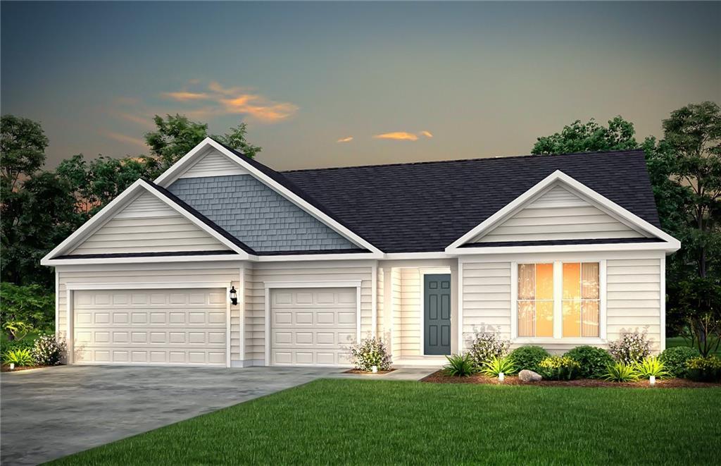 view of front of property with a garage, a shingled roof, a yard, and concrete driveway