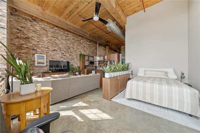 bedroom featuring a towering ceiling, brick wall, beam ceiling, and wooden ceiling