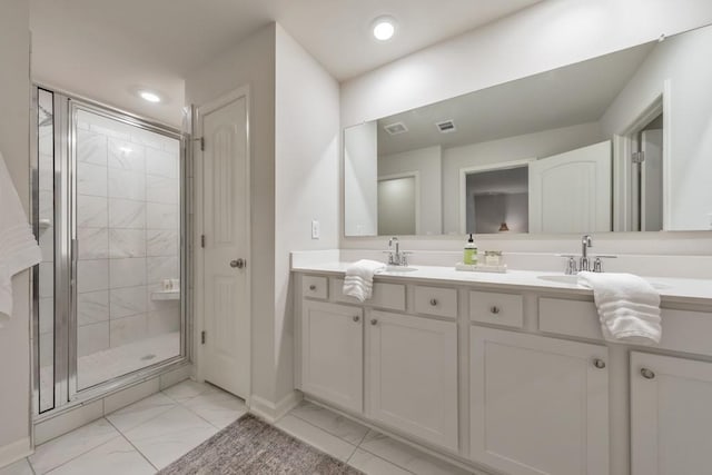 bathroom with vanity and walk in shower