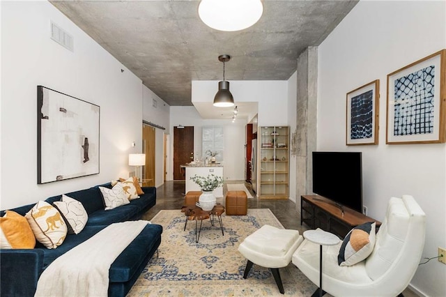 living room featuring visible vents