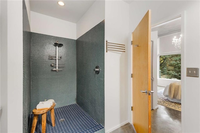 full bath with connected bathroom, recessed lighting, and tiled shower