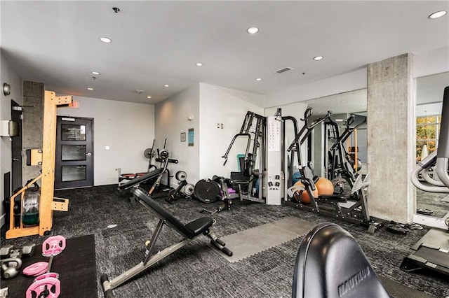 workout area featuring recessed lighting