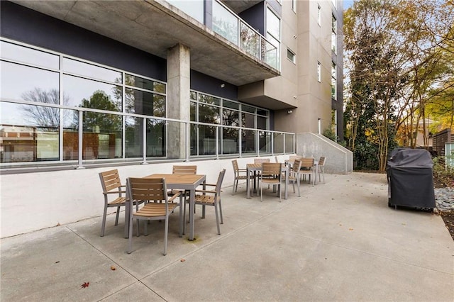 view of patio / terrace featuring area for grilling and outdoor dining space