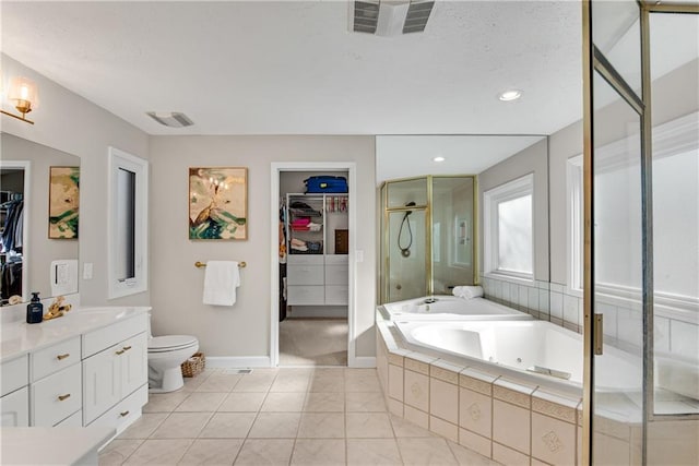 bathroom with tile patterned floors, visible vents, toilet, a stall shower, and a jetted tub