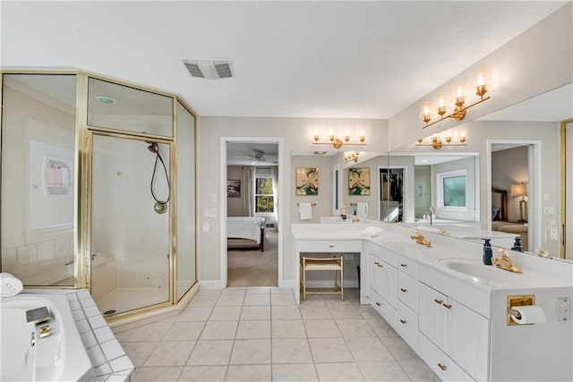 ensuite bathroom with visible vents, double vanity, a stall shower, ensuite bathroom, and tile patterned floors