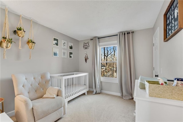 bedroom featuring baseboards and carpet floors