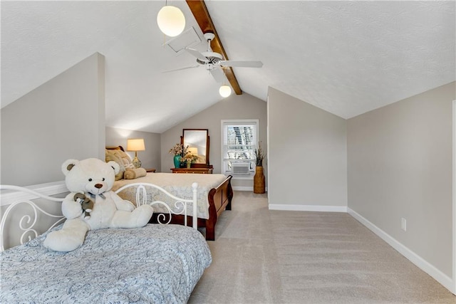 bedroom featuring a ceiling fan, a textured ceiling, baseboards, light colored carpet, and vaulted ceiling with beams