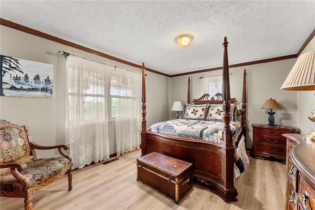 bedroom featuring light wood-style floors, multiple windows, and crown molding