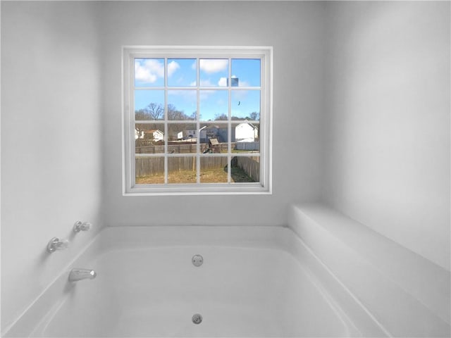 full bathroom featuring a garden tub