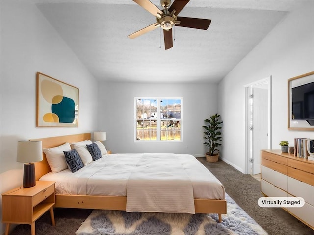 bedroom featuring vaulted ceiling, carpet floors, ceiling fan, and baseboards