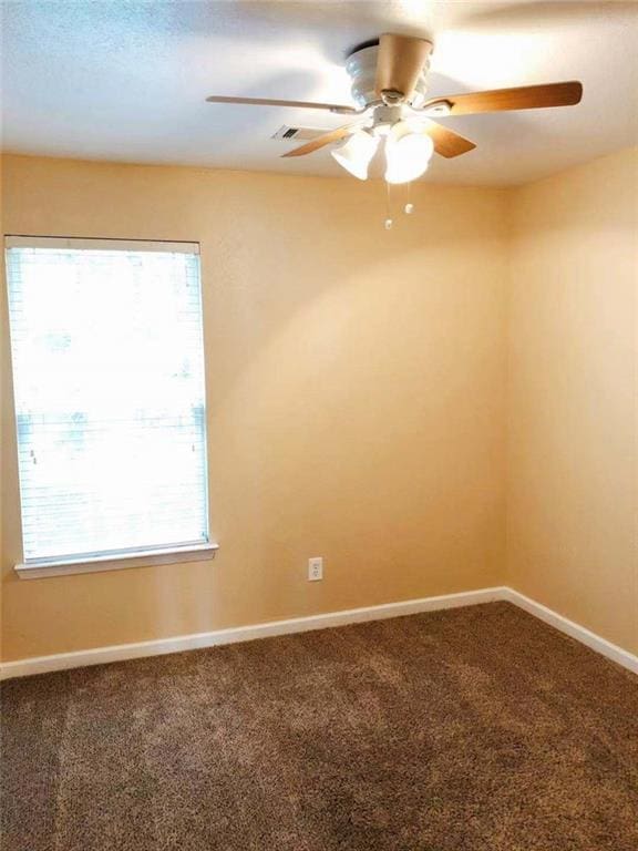 301 Brookview Dr, Riverdale, GA 30274 - empty room with carpet and ceiling fan