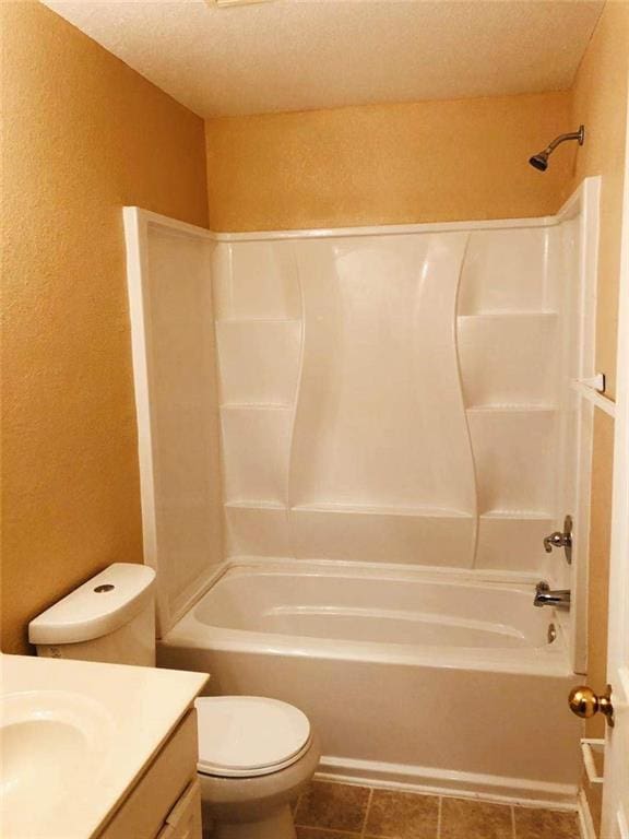 301 Brookview Dr, Riverdale, GA 30274 - full bathroom with vanity, a textured wall, shower / washtub combination, and a textured ceiling
