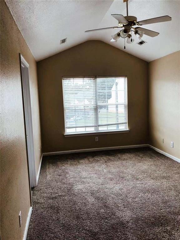 301 Brookview Dr, Riverdale, GA 30274 - carpeted empty room with lofted ceiling and ceiling fan