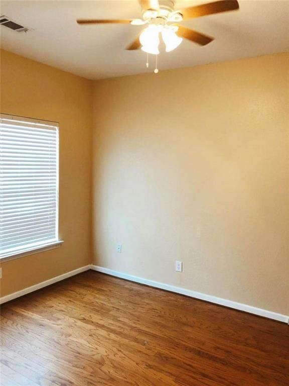 301 Brookview Dr, Riverdale, GA 30274 - unfurnished room with wood finished floors and a ceiling fan