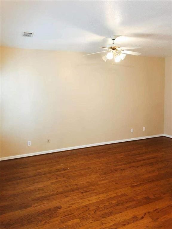 301 Brookview Dr, Riverdale, GA 30274 - unfurnished room featuring a ceiling fan and dark wood-type flooring
