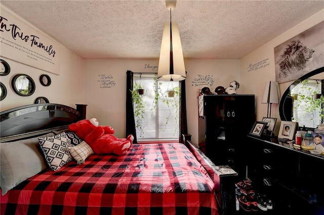 bedroom with a textured ceiling