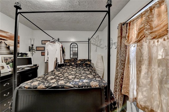 unfurnished bedroom with a textured ceiling