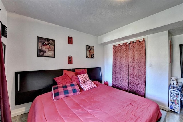 bedroom with a textured ceiling