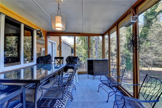 unfurnished sunroom with a wealth of natural light