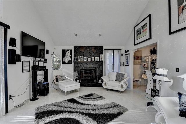 tiled living room featuring a fireplace and lofted ceiling