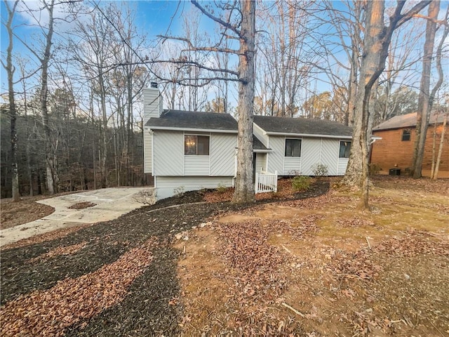 bi-level home with a chimney