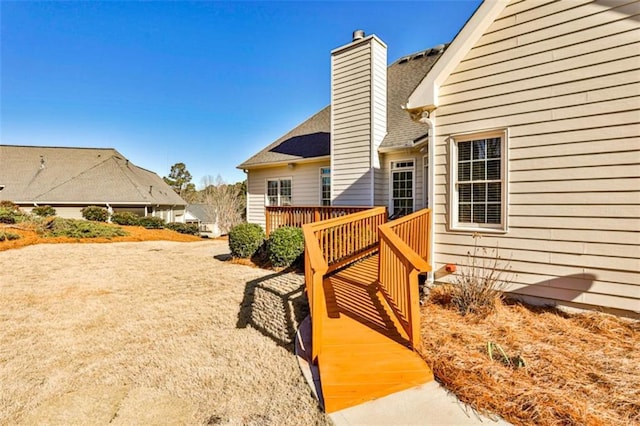 view of yard with a wooden deck