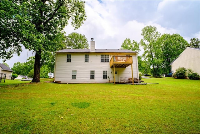 1444 Elliotts Ln, Auburn, GA 30011 - back of property with a chimney, a yard, and a deck