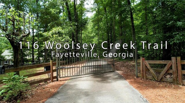 116 Woolsey Creek Trl, Fayetteville, GA 30215 - gate featuring fence