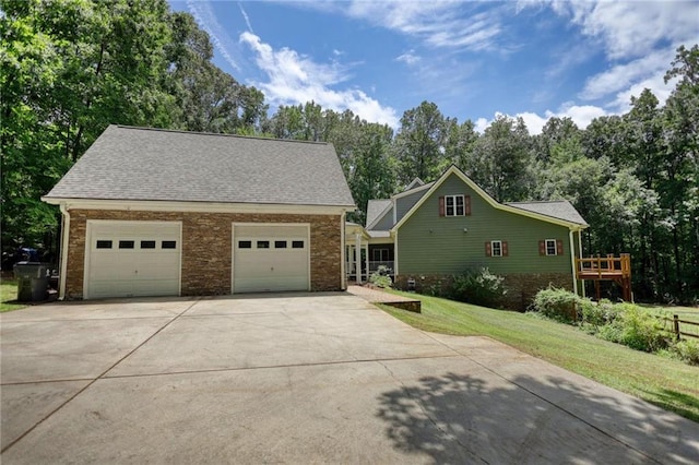 116 Woolsey Creek Trl, Fayetteville, GA 30215 - craftsman house featuring driveway, a front yard, an attached garage, and view of scattered trees
