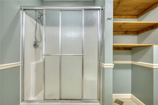 116 Woolsey Creek Trl, Fayetteville, GA 30215 - bathroom featuring a shower stall and baseboards
