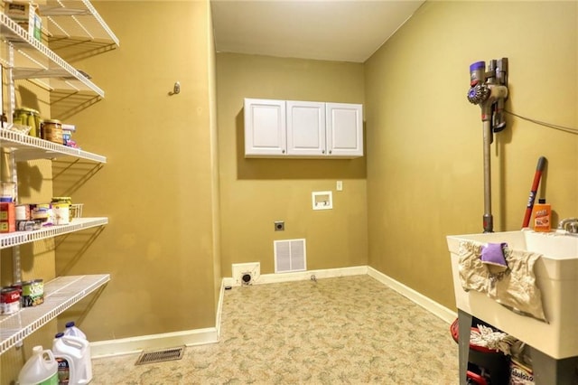 116 Woolsey Creek Trl, Fayetteville, GA 30215 - laundry area featuring electric dryer hookup, hookup for a washing machine, cabinet space, baseboards, and carpet floors