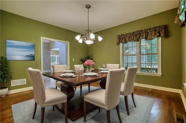 116 Woolsey Creek Trl, Fayetteville, GA 30215 - dining room featuring a chandelier, baseboards, and wood finished floors