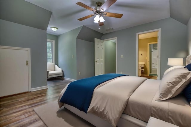 116 Woolsey Creek Trl, Fayetteville, GA 30215 - bedroom featuring baseboards, wood finished floors, vaulted ceiling, ensuite bath, and a ceiling fan