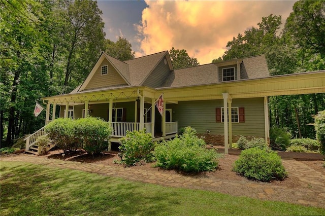 116 Woolsey Creek Trl, Fayetteville, GA 30215 - view of front of house with a porch, a front lawn, and roof with shingles