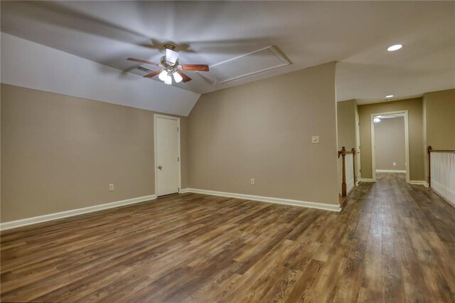 116 Woolsey Creek Trl, Fayetteville, GA 30215 - additional living space with attic access, ceiling fan, dark wood-style flooring, lofted ceiling, and baseboards