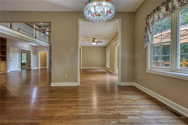 116 Woolsey Creek Trl, Fayetteville, GA 30215 - unfurnished dining area with a ceiling fan, plenty of natural light, and baseboards