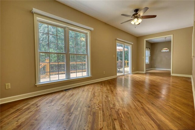 116 Woolsey Creek Trl, Fayetteville, GA 30215 - spare room with wood finished floors, baseboards, and a ceiling fan