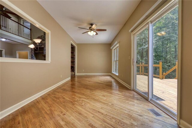 116 Woolsey Creek Trl, Fayetteville, GA 30215 - unfurnished room featuring ceiling fan, wood finished floors, and baseboards